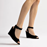 Deena By Larroudé Wedge Sandal In Black Suede